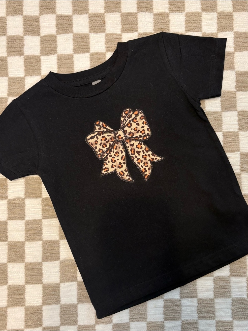 Black Short Sleeve Kids Tee with Leopard Bow Graphic